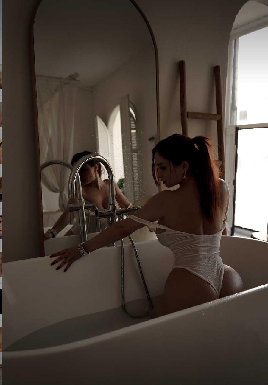 A playful frame from Miranda Faith nude — online in St. Johns